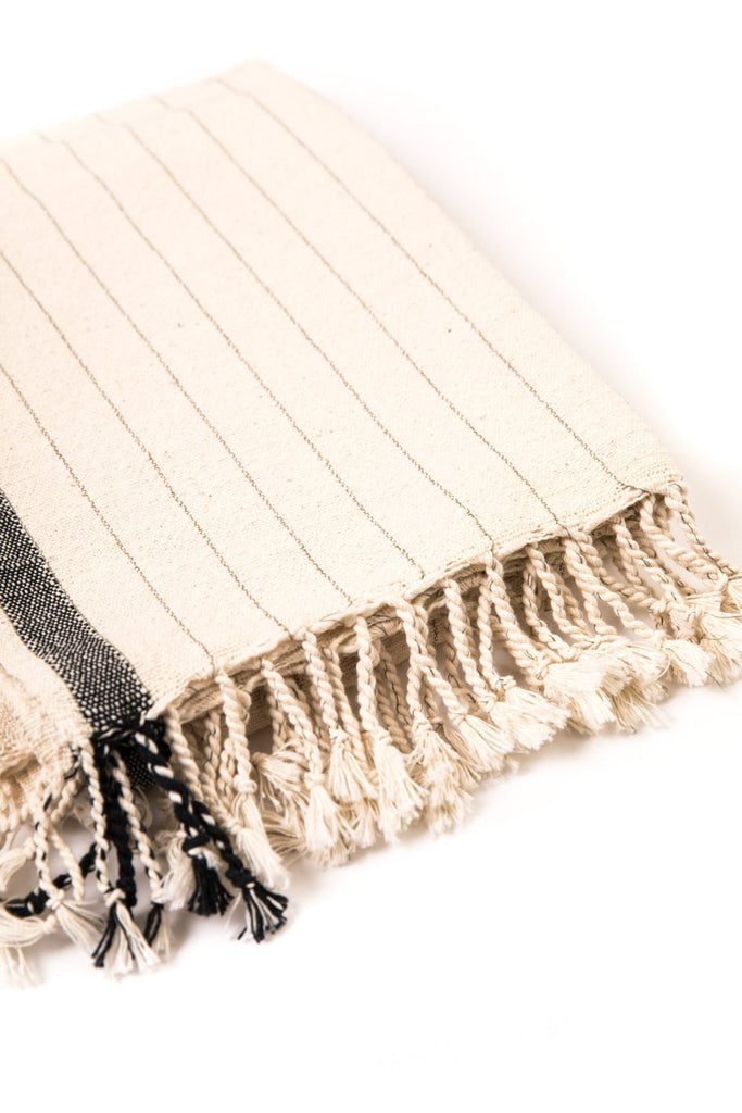 natural colored Turkish towel with grey thin stripes and a thick horizontal stripe