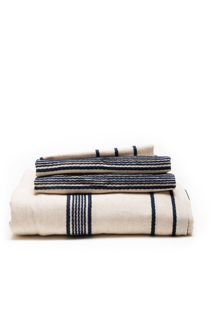 natural duvet cover set with navy colored thin stripes in-between