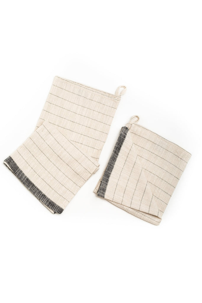 natural colored hand towel with grey thin stripes and a thick horizontal stripe